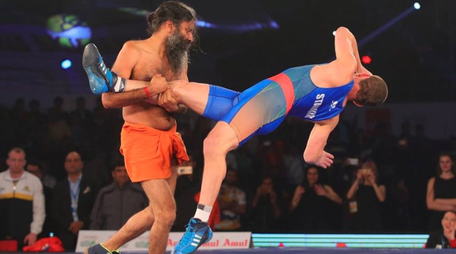 Ramdev beats Olympic medalist in a friendly bout