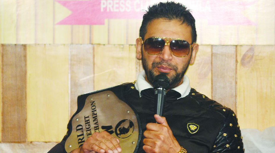 Promote wrestling in Himachal, says champion grappler Rapta