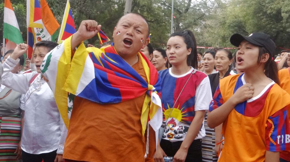 In pics: Tibetans hit Delhi roads to mark uprising day