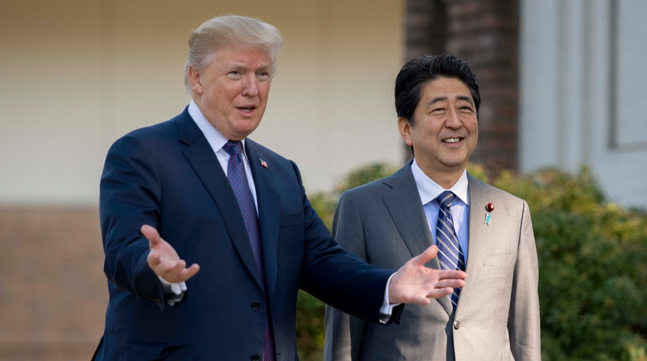 Abe seeks to move Japan off sidelines with Trump trip