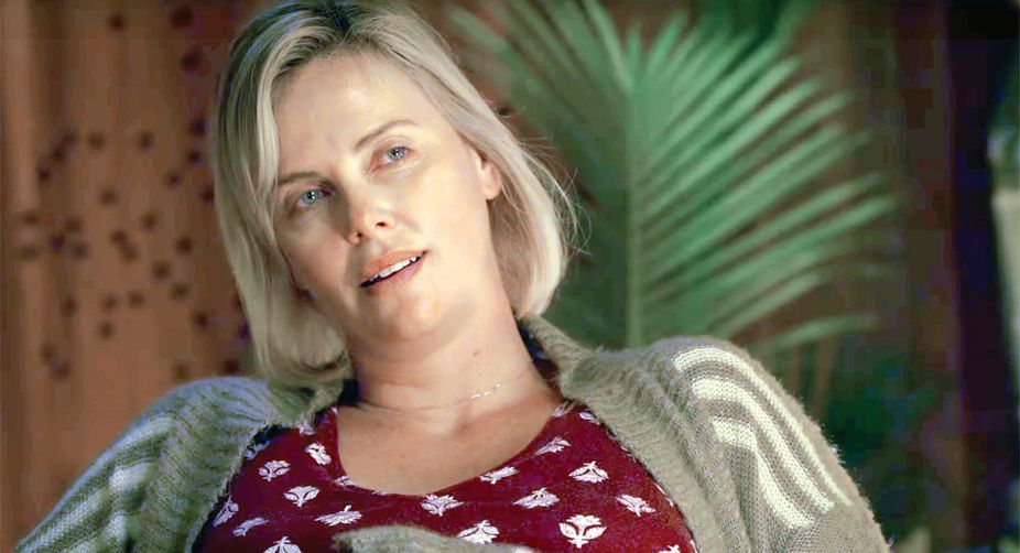 Theron in a scene from Tully, Charlize Theron