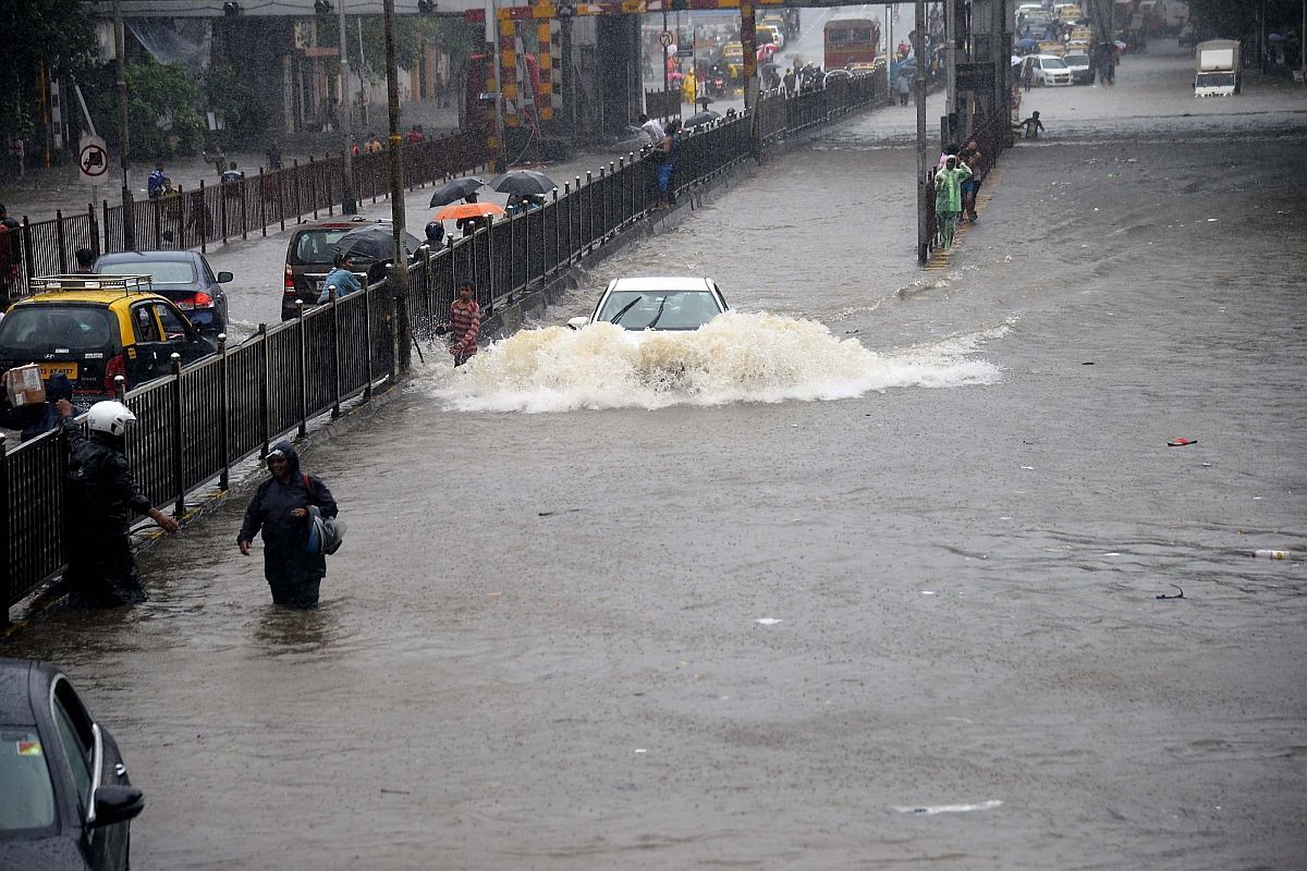 Normal life hit as Mumbai sees record rainfall, rail, road traffic ...