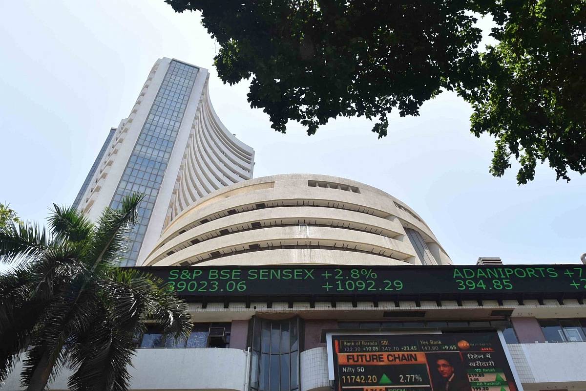 Sensex, Nifty open slightly higher