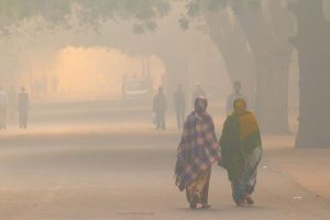 Delhi gets shrouded in dense fog as cold wave grips the city