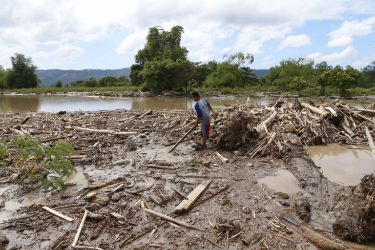 Death toll climbs to 54 as heavy rains cause floods, landslides in