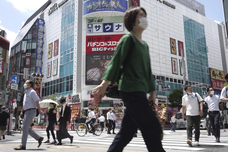 Officials in Tokyo alarmed as Covid cases hit record highs