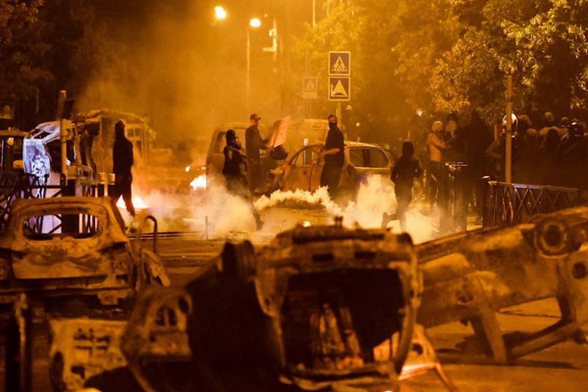 France violence: 13 buses set on fire in Aubervilliers after teenager shot dead