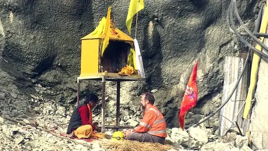 ‘When science and technology meet faith’: Tunneling expert Dix offers prayers at makeshift temple