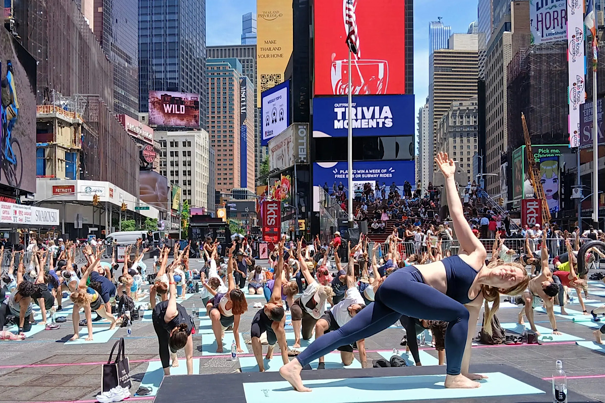Yogis create island of stillness at New York’s frenetic Times Square