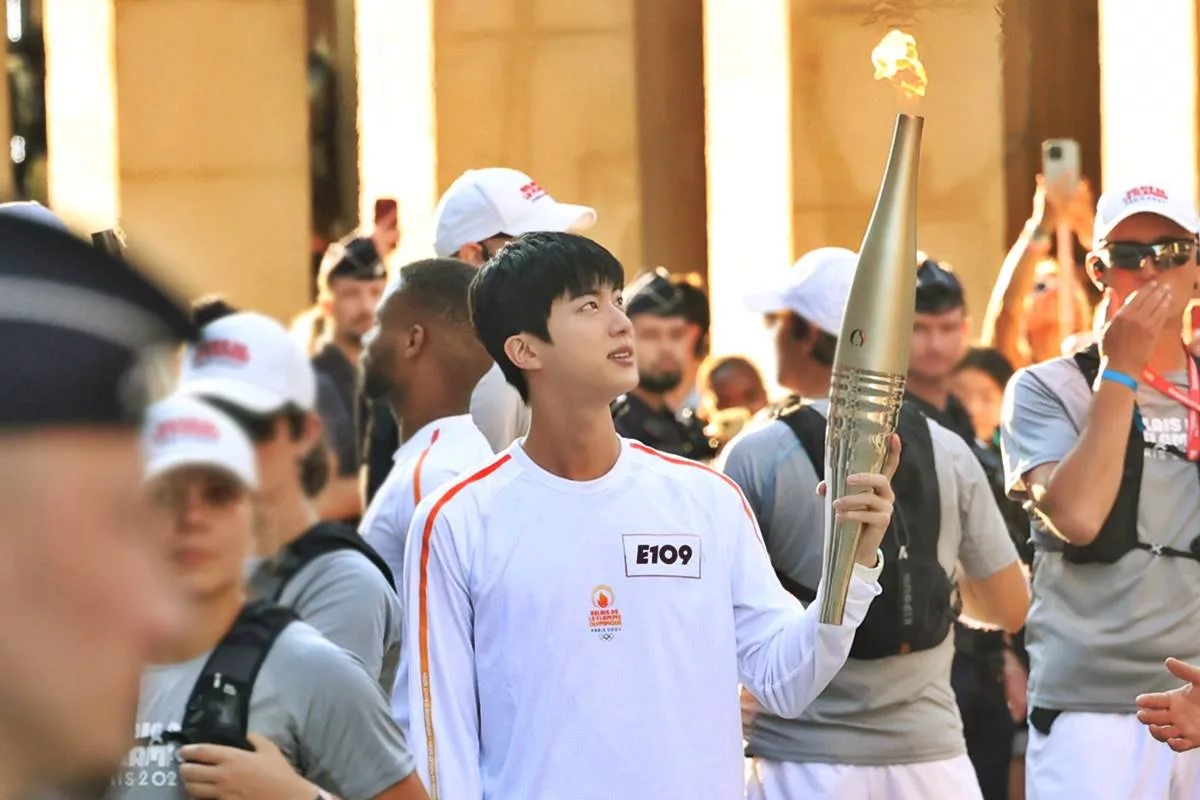 BTS’s Jin lights up Paris as torchbearer for 2024 Olympics