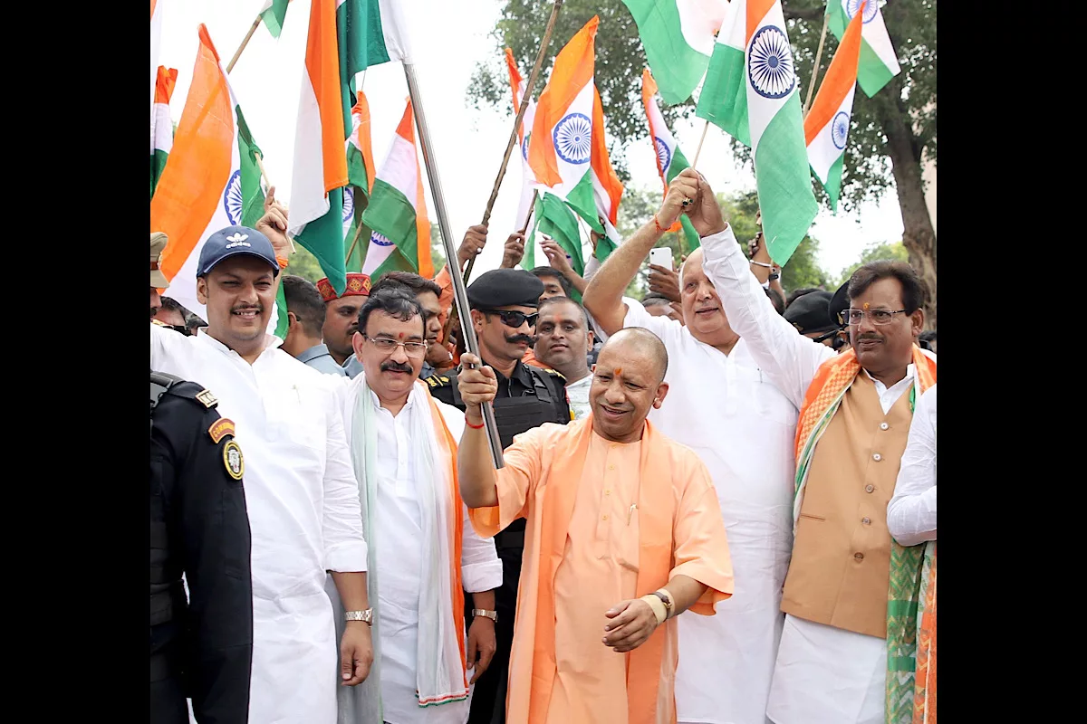 UP CM Yogi hoists national flag at his official residence