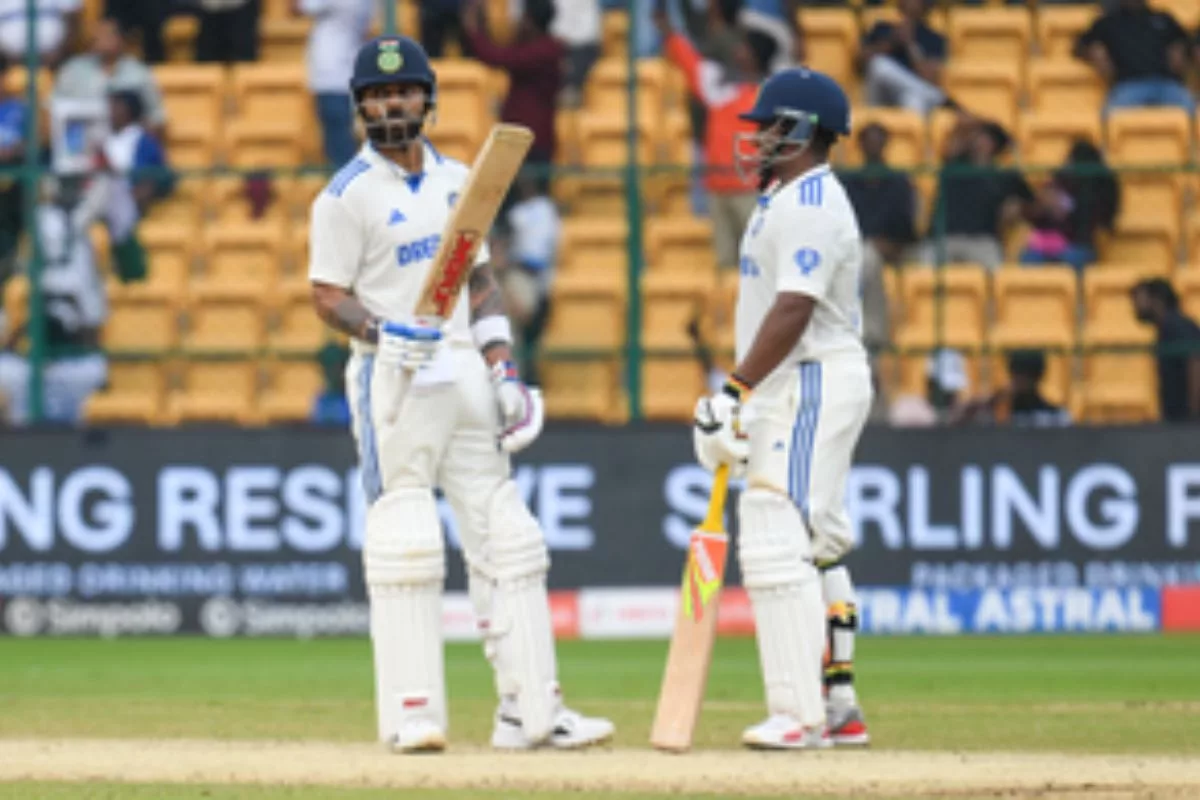 Kohli, Sarfaraj lead India’s counterattack after Ravindra’s ton propels NZ to 356