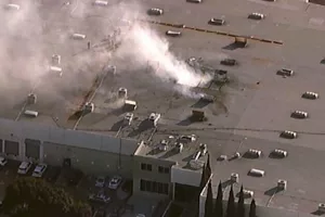 Small plane crashes into California building, claims two lives