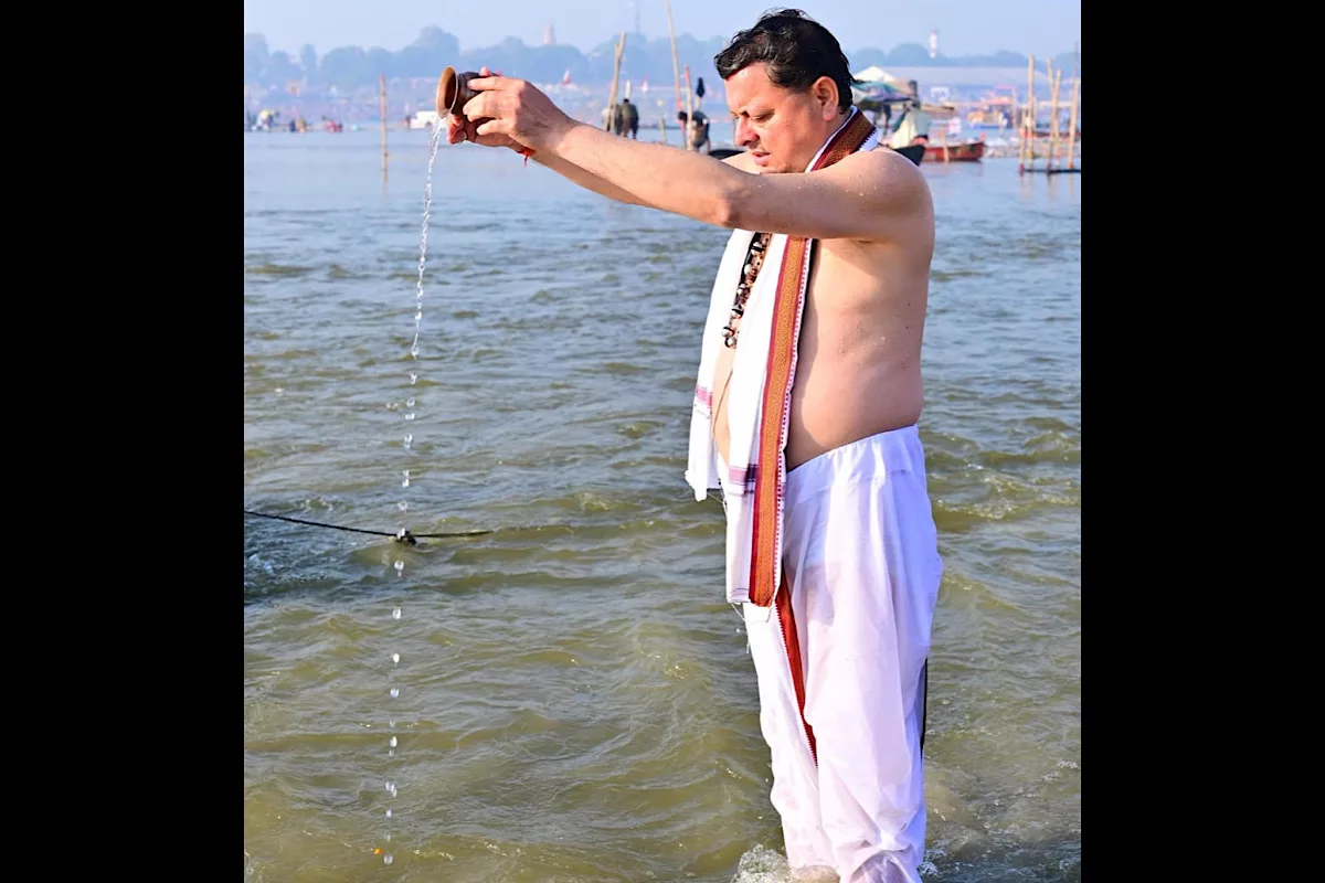 Dhami takes dip in Sangam, pledges grand  Kumbh 2027 in Haridwar